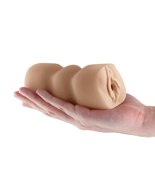 Hand holding a pocket pussy so show the size of the stroker sleeve 