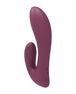 Showing the back of the rabbit style vibrator where the buttons are and charging 