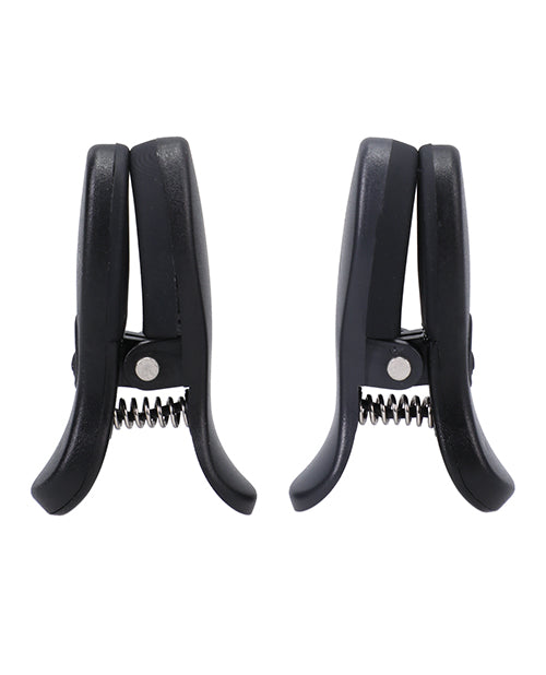 Merci Vibro Grippers rechargeable vibrating nipple clamps in black with adjustable grip and wireless design