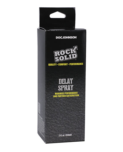 Black packaging of Doc Johnson Rock Solid Delay Spray on a white background